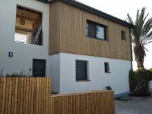 Notre zone d'activité pour ce service Prix pour l'agrandissement d'une maison à ossature bois avec toit plat et grande baie vitrée panoramique